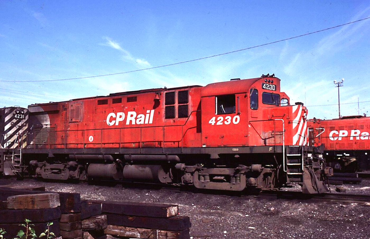 MLW-built C-424 4230 wears a CP repainted A8L scheme with missing frame circles at Sudbury ON.
